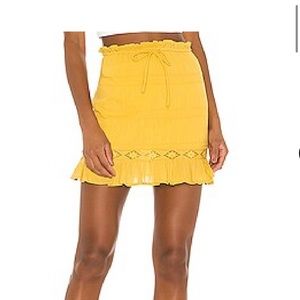 Mini ruffle skirt in golden yellow